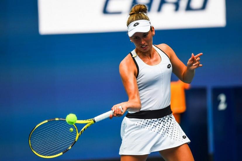 Elise Mertens of Belgium returns a shot during the women's doubles final trophy at the 2022 Miami Open at Hard Rock Stadium in Miami Gardens, Florida, on April 3, 2022. Laura Siegemund of Germany and Vera Zvonareva of Russia defeated Elise Mertens of Belgium, and Veronika Kudermetova of Russia. CHANDAN KHANNA / AFP
