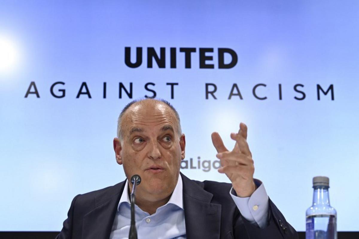 The president of the Spanish football league 'La Liga' Javier Tebas gestures as he gives a press conference in Madrid on May 25, 2023 amid an international outcry after racist abuse was hurled at Real Madrid's Brazilian forward Vinicius Junior during a Spanish league match. The 22-year-old Brazilian forward drew international support after making a stand against the last racist abuse he received from Valencia supporters on May 21. OSCAR DEL POZO / AFP