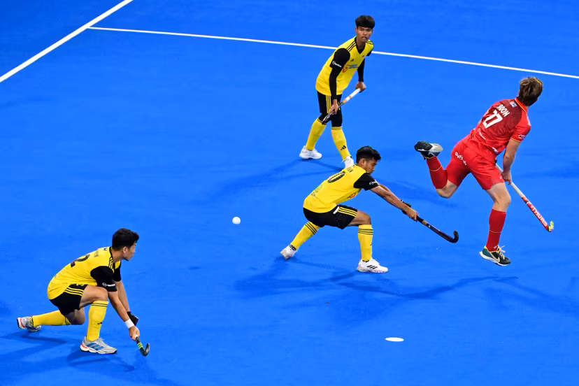 Malaysia's Ashran Hamsani and Belgium's Tom Boon pictured in action during a hockey game between Belgian Lions and Malaysia, the third (out of three) matches during the group stage of the men's 2026 Hockey World Cup, Wednesday 19 August 2026 in Wavre. The 2026 edition of the Hockey World Cup takes place in Belgium and The Netherlands from August 15 to August 30. BELGA PHOTO DIRK WAEM