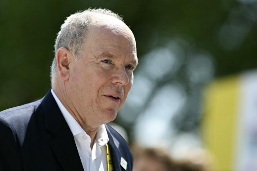 Prince Albert II of Monaco looks on as he awaits the start of the 13th stage of the 113th edition of the Tour de France cycling race, 205,8 km between Dole and Belfort in eastern France, on July 17, 2026. Loic VENANCE / AFP