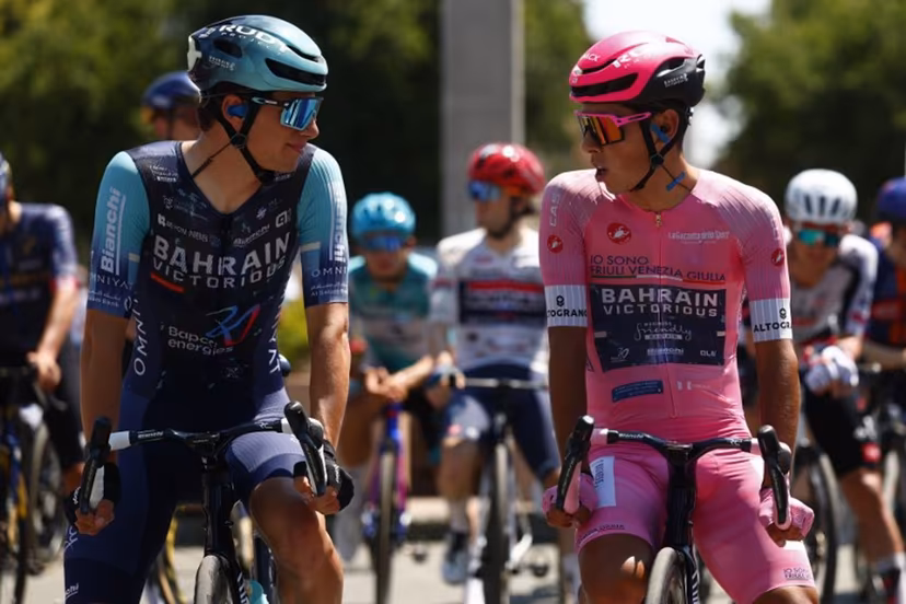 Pink jersey Bahrain - Victorious Portuguese rider Afonso Eulalio chats with teammate Bahrain - Victorious Belgian rider Alec Segaert before the 13th stage of the Giro d'Italia 2026 - Tour of Italy cycling race between Alessandria and Verbania, Italy, on May 22, 2026. Luca Bettini / AFP