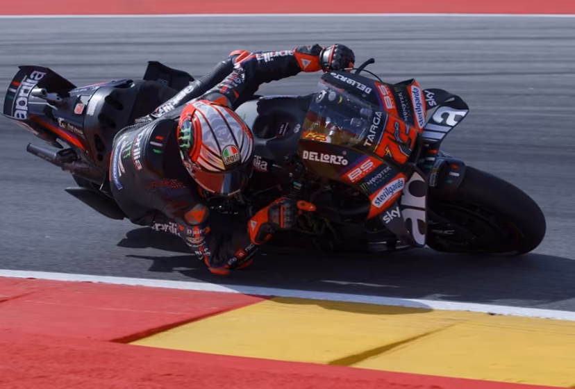 Team Aprilia Racing's Marco Bezzecchi takes a curve during the first free practice at the Motorland circuit in Alcaniz, northeastern Spain, on the eve of the Moto GP Aragon Grand Prix, on August 28, 2026. Pierre-Philippe MARCOU / AFP