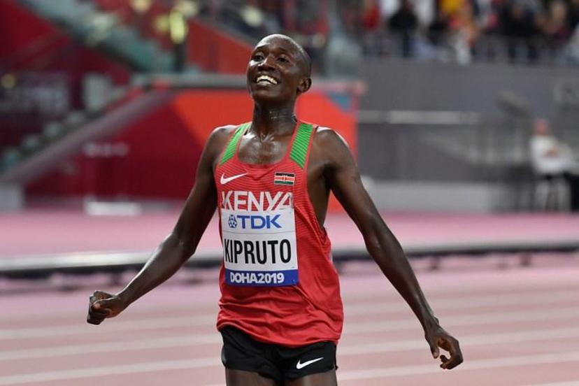 Kenya's Rhonex Kipruto celebrates finishing third in the Men's 10,000m final at the 2019 IAAF Athletics World Championships at the Khalifa International stadium in Doha on October 6, 2019. ANDREJ ISAKOVIC / AFP