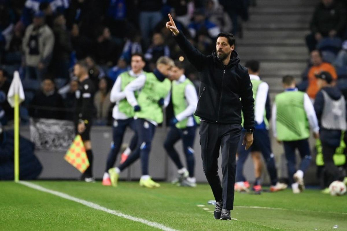 FC Porto's Portuguese coach Vitor Bruno gestures during the UEFA Europa League 1st round day 6 football match between FC Porto and Midtjylland at the Dragao stadium, on December 12, 2024. MIGUEL RIOPA / AFP