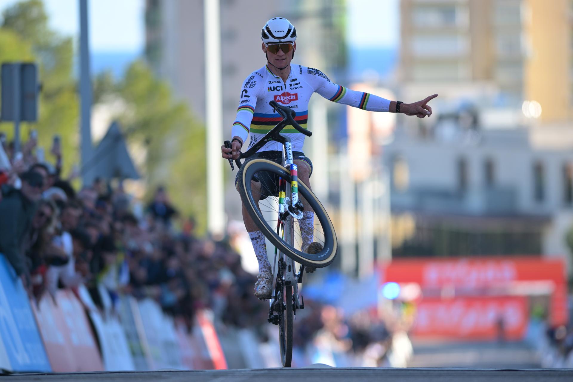 Dutch Mathieu Van Der Poel celebrates as he crosses the finish line to win the Men's Elite race at the cyclocross cycling event in Benidorm, Spain, Sunday 18 January 2026, stage 10/12 in the UCI World Cup competition. BELGA PHOTO DAVID PINTENS