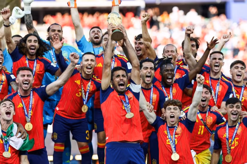 Spain's midfielder #16 Rodri lifts the trophy with his teammates after winning the 2026 World Cup football tournament final match between Spain and Argentina at the New York/New Jersey Stadium in East Rutherford on July 19, 2026. FRANCK FIFE / AFP