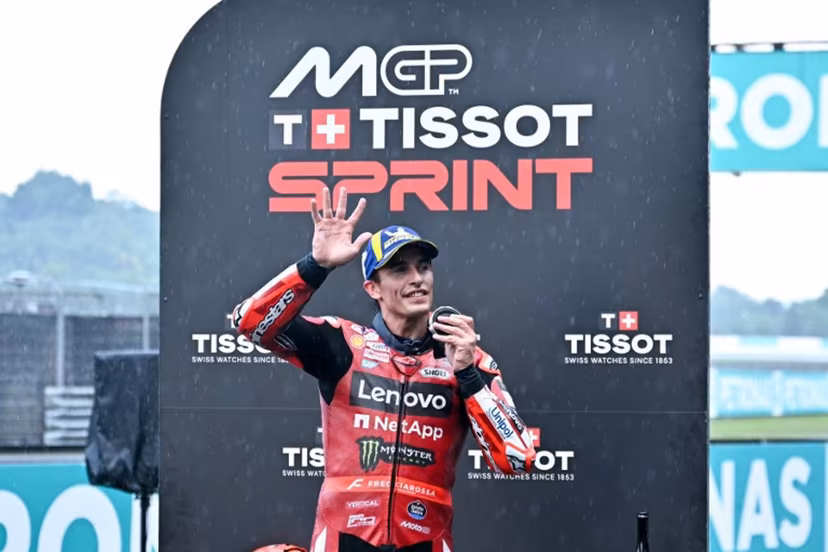 Second place Ducati Lenovo Team's Spanish rider Marc Marquez gestures on the podium of the sprint race of the MotoGP Malaysian Grand Prix at the Sepang International Circuit in Sepang on October 31, 2026. MOHD RASFAN / AFP