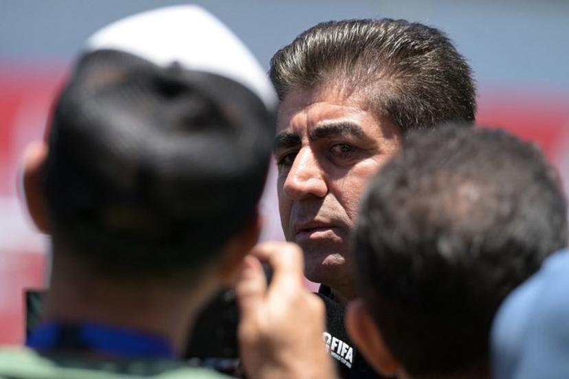 The secretary general of the Football Federation of Iran (FFIRI), Hedayat Mombeini, speaks with media during a training session ahead of Iran's FIFA World Cup 2026 Group G football match against Belgium at Centro Xoloitzcuintle in Tijuana on June 19, 2026. Guillermo Arias / AFP