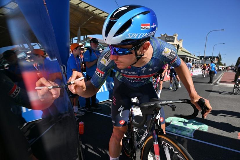 SoudalÐQuick-Step rider Andrea Raccagni Noviero of Italy signs on prior to the start of stage three of the Tour Down Under UCI Men's Cycling race in Adelaide on January 23, 2026. Brenton Edwards / AFP