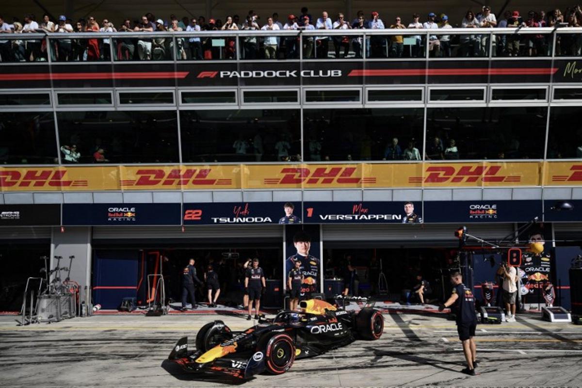Red Bull Racing's Dutch driver Max Verstappen sits in his car in the pit during the qualifying session ahead of the Italian Formula One Grand Prix at the Autodromo Nazionale Monza circuit, in Monza, northern Italy, on September 6, 2025. Marco BERTORELLO / POOL / AFP