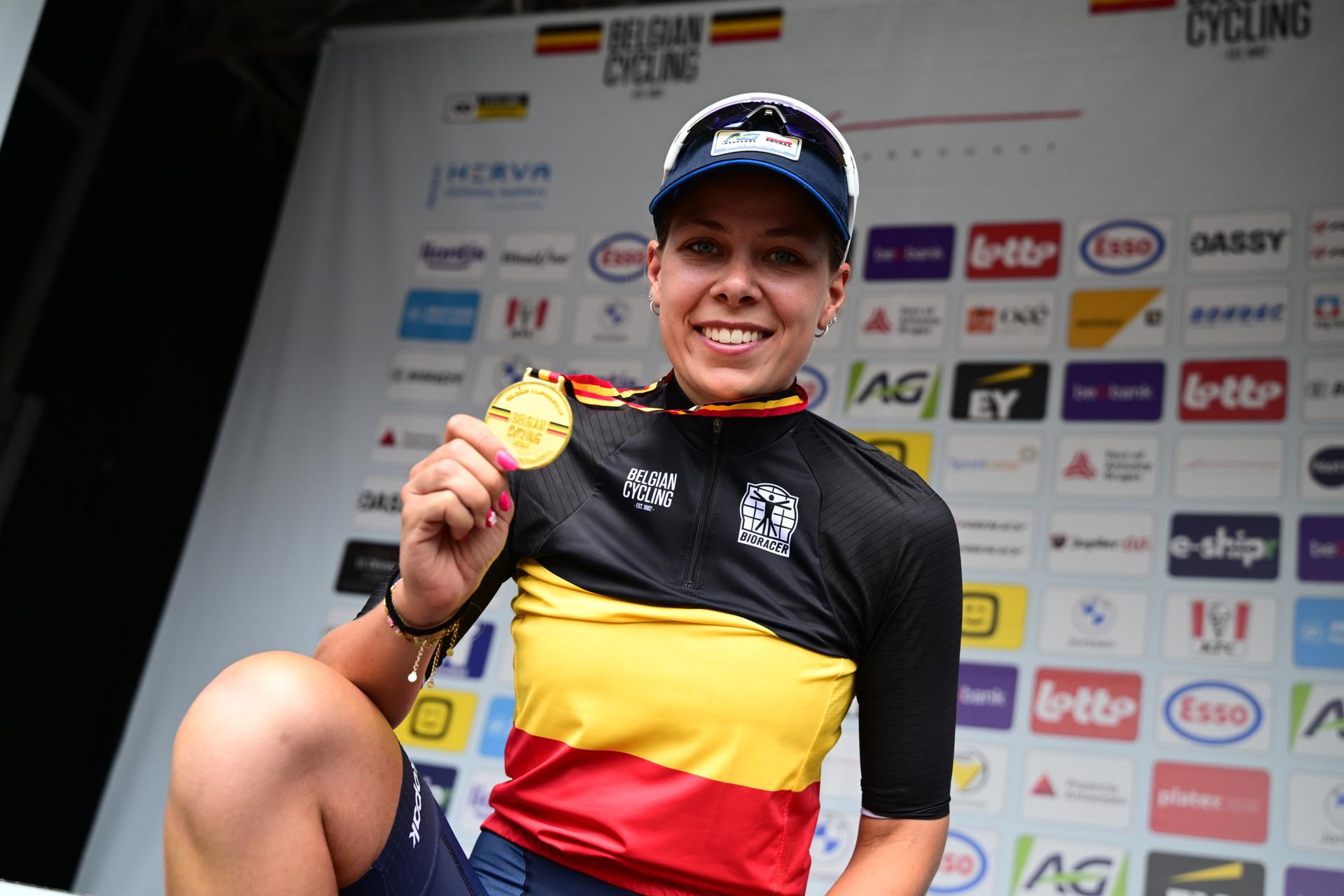 Belgian Shari Bossuyt of AG Insurance-Soudal Team celebrates on the podium with the gold medal after winning the women's elite race (137km) at the Belgian Cycling Championships, in Brasschaat, on Sunday 28 June 2026. BELGA PHOTO TOM GOYVAERTS