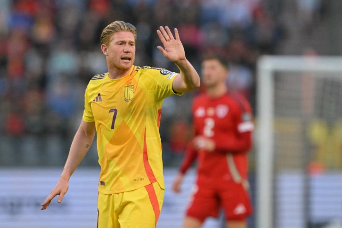 Belgium's midfielder #07 Kevin De Bruyne (L) gestures during the FIFA World Cup 2026 Group J European qualification football match between Belgium and Wales at the King Baudouin Stadium in Brussels, on June 9, 2025. NICOLAS TUCAT / AFP