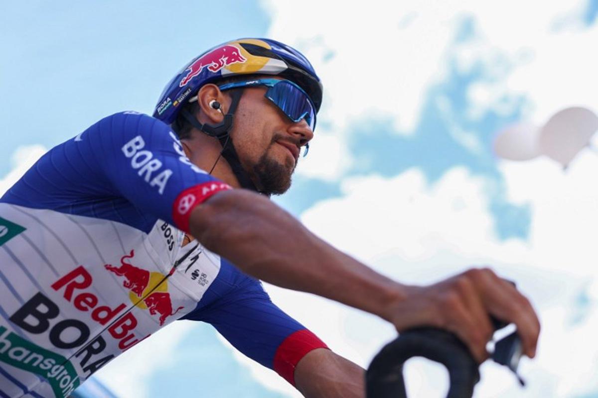 Red Bull - Bora - Hansgrohe's Colombian rider Daniel Felipe Martinez Poveda reacts ahead of the start of the 5th stage of the Tour Auvergne-Rhone-Alpes cycling race (formerly known as the Criterium du Dauphine), 195,8km between Saint-Chamond and Villars-les-Dombes, central France, on June 11, 2026. Anne-Christine POUJOULAT / AFP