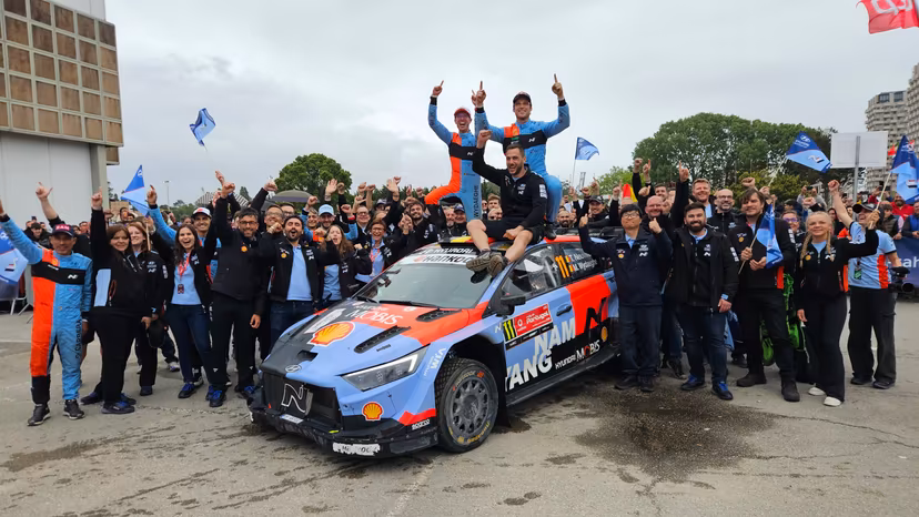 Thierry Neuville (R) and co-pilot Martijn Wydaeghe celebrate on the top of their car with their team after winning the Rally de Portugal event in Baltar, Portugal on Sunday 10 May 2026. BELGA PHOTO ERIC DUPAIN