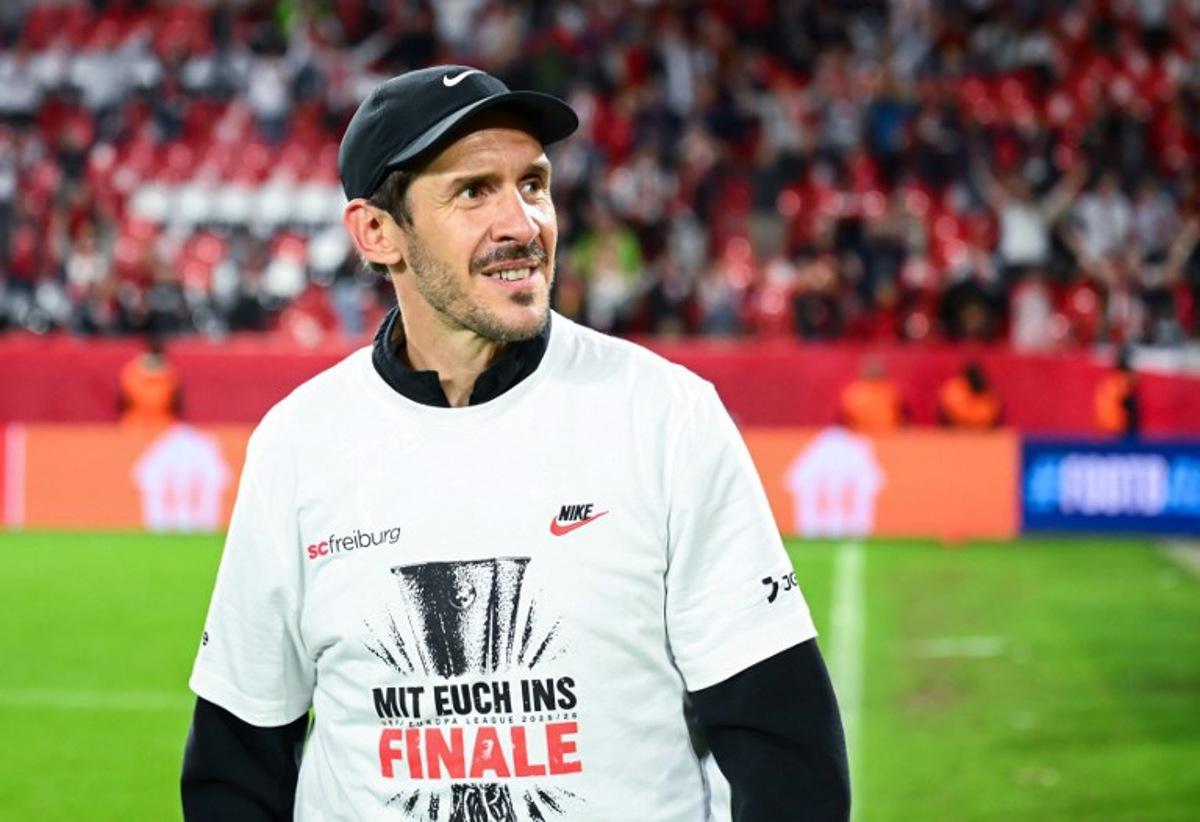 Freiburg's German head coach Julian Schuster celebrates after the UEFA Europa League semi-final second leg football match between SC Freiburg and SC Braga in Freiburg im Breisgau, southwestern Germany on May 7, 2026. Silas STEIN / AFP