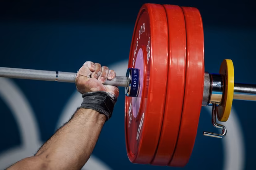 Estonia's Mart Seim competes in the men's +102kg weightlifting event during the Paris 2024 Olympic Games at the South Paris Arena in Paris, on August 10, 2024. JEFF PACHOUD / AFP