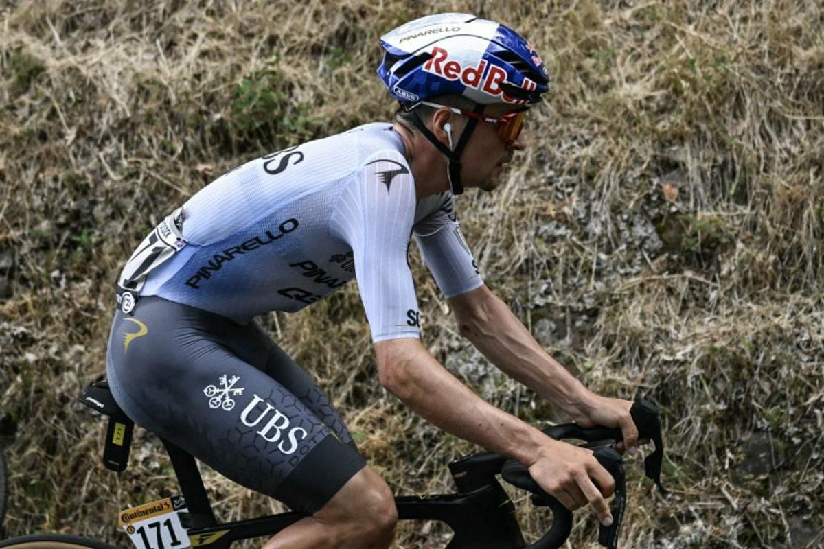 Pinarello Q36.5 Pro Cycling Team's British rider Tom Pidcock cycles during the 14th stage of the 113th edition of the Tour de France cycling race, 155,3 km between Mulhouse and Le Markstein in the Vosges mountains, on July 18, 2026. Loic VENANCE / AFP