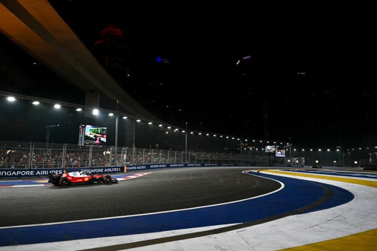 Ferrari's Monegasque driver Charles Leclerc drives during the Formula One Singapore Grand Prix at the Marina Bay Street Circuit in Singapore on October 11, 2026. Lillian SUWANRUMPHA / AFP