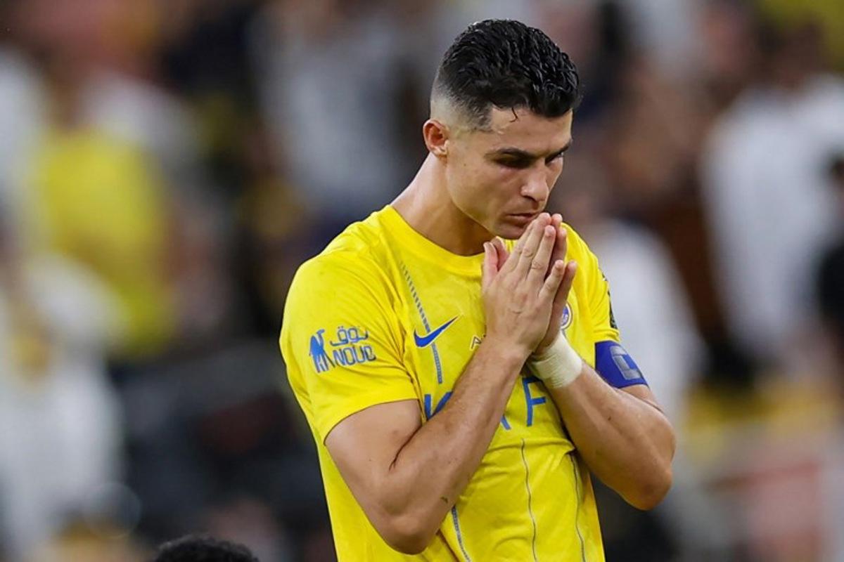 Nassr's Portuguese forward #07 Cristiano Ronaldo reacts during the penalty shootout of the King's Cup final match between Al-Nassr and Al-Hilal at the King Abdullah Sport City Stadium in Jeddah on May 31, 2024. AFP