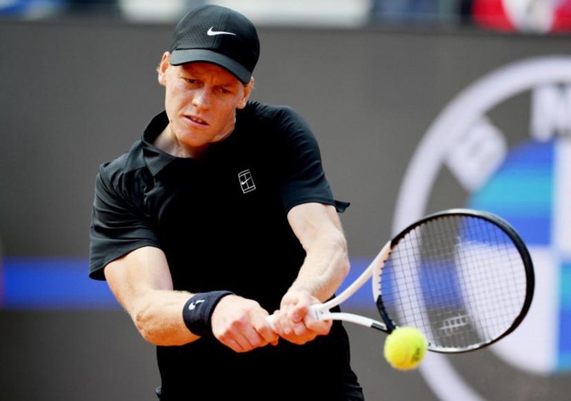 Italy's Jannik Sinner hits a return to Italy's Andrea Pellegrino during the ATP Rome Open tennis tournament at Foro Italico in Rome on May 12, 2026. Tiziana FABI / AFP