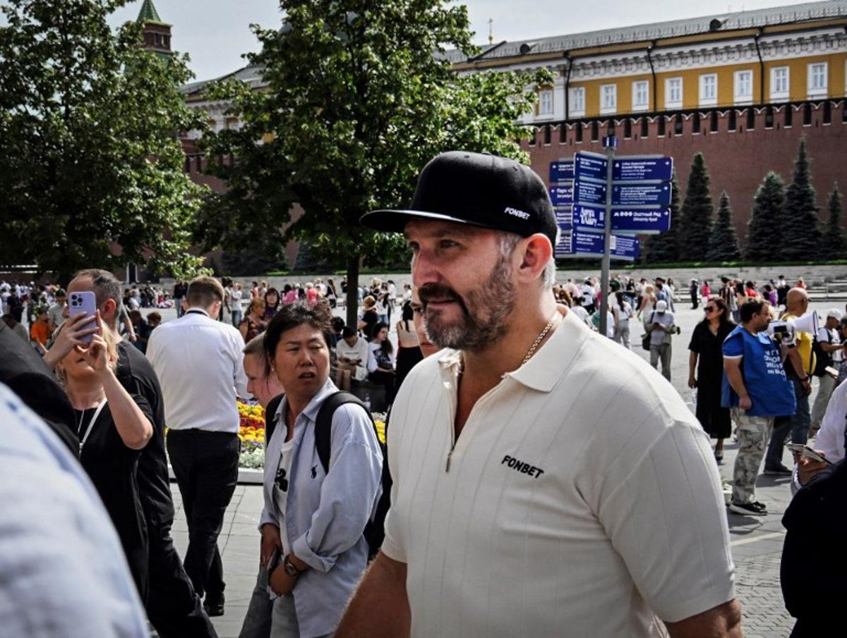 Russian NHL star Alexander Ovechkin walks along The Red Square in Moscow on July 19, 2025, during celebrations in his honour, after the Washington Capitals star scored his 895th goal breaking Wayne Gretzky's all time NHL record on April 6, 2025. Alexander NEMENOV / AFP