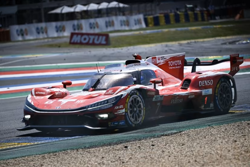 The Toyota Racing's car of British driver Mike Conway, Japanese driver Kamui Kobayashi and Dutch driver Nyck de Vriestakes a corner during the 94th edition of the 24 Hours of Le Mans at the Le Mans circuit, north-western France, on June 14, 2026. Lou BENOIST / AFP