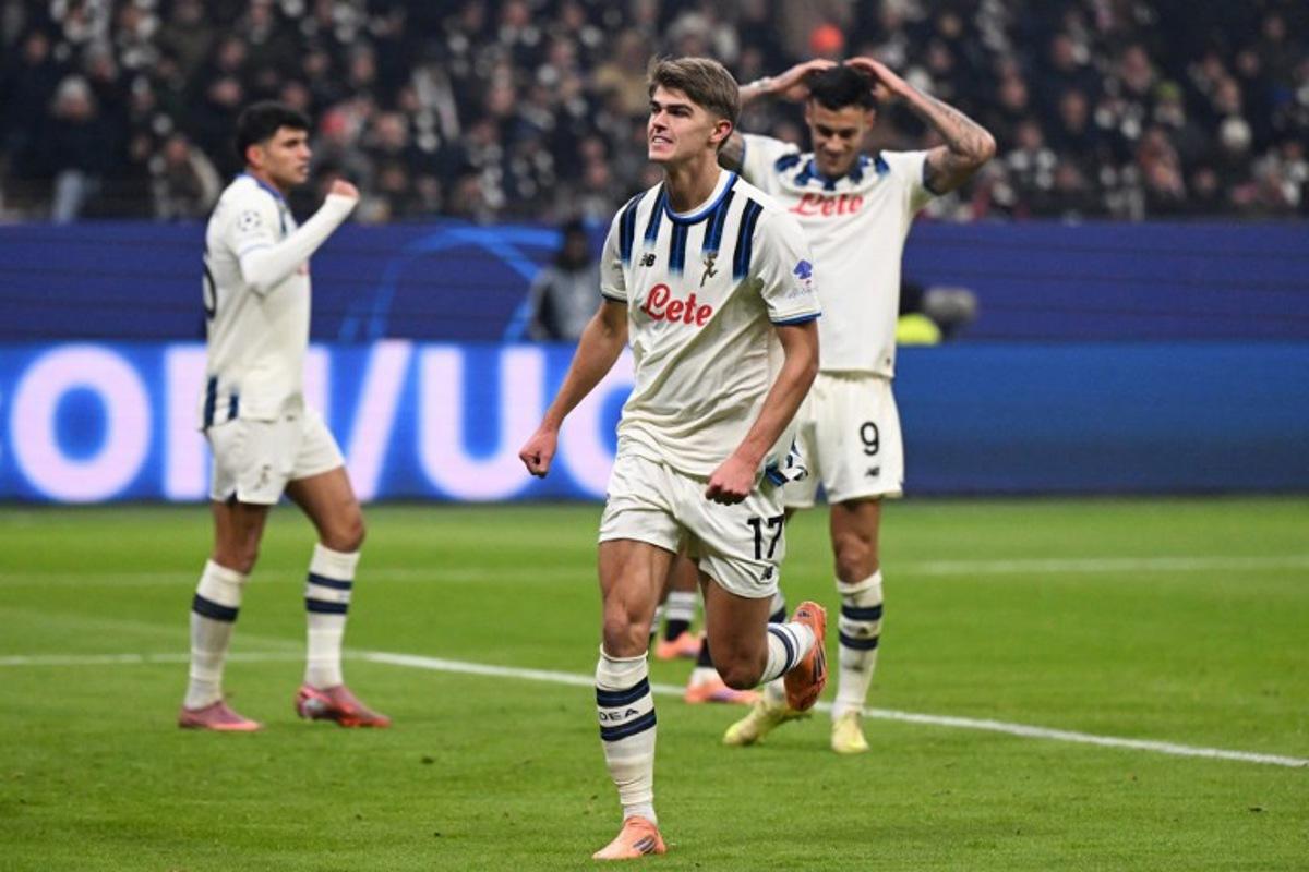 Atalanta's Belgian forward #17 Charles De Ketelaere celebrates scoring his team's third goal during the UEFA Champions League league phase day 5 football match between Eintracht Frankfurt and Atalanta Bergamo in Frankfurt, Germany, on November 26, 2025. Kirill KUDRYAVTSEV / AFP