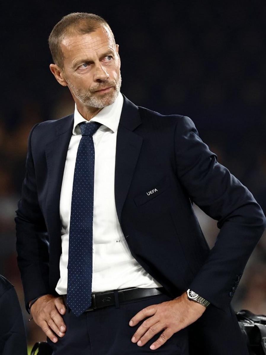 UEFA President Aleksander Ceferin looks on at the end of the UEFA Supercup football match between Champions League winners Paris Saint Germain (PSG) and Europa League winners Aston Villa in Salzburg, Austria on August 12, 2026. FRANCK FIFE / AFP