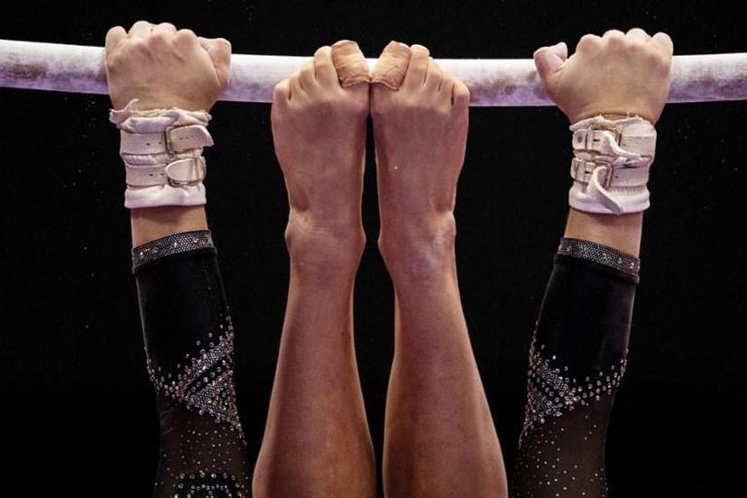Italy's Asia D'amato competes in the uneven bars event at the women¿s team qualification during the Artistic Gymnastics World Championships at the Kitakyushu City Gymnasium in Kitakyushu, Fukuoka prefecture on October 18, 2021. Philip FONG / AFP