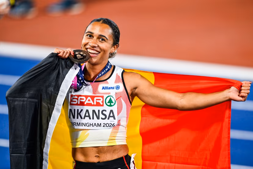 Belgian Delphine Nkansa celebrates with her bronze medal and the Belgian flag after the final of the women's 100m race at the European Athletics Championships (August 10-18) in Birmingham, United Kingdom, on Monday 10 August 2026. BELGA PHOTO ERIC LALMAND