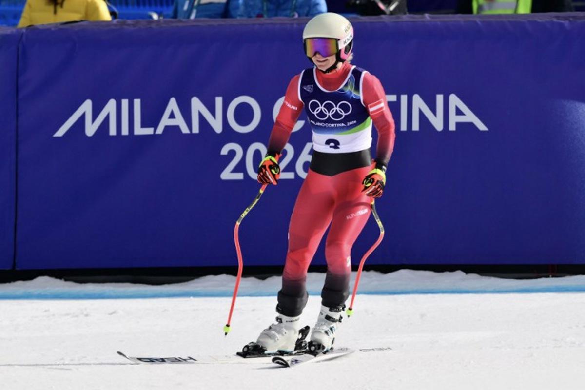 Austria's Ariane Raedler reacts in the finish area after competing in the downhill run of the women's team combined event during the Milano Cortina 2026 Winter Olympic Games at the Tofane Alpine Skiing Centre in Cortina d'Ampezzo on February 10, 2026. Stefano RELLANDINI / AFP