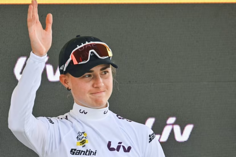 UAE Team ADQ's Spanish rider Paula Blasi celebrates on the podium with the best young rider's white jersey after the 3rd (out of 9) stage of the fifth edition of the Women's Tour de France cycling race, 156.5 km from Geneva to Poligny, in Poligny, central-eastern France on August 3, 2026. NICOLAS TUCAT / AFP