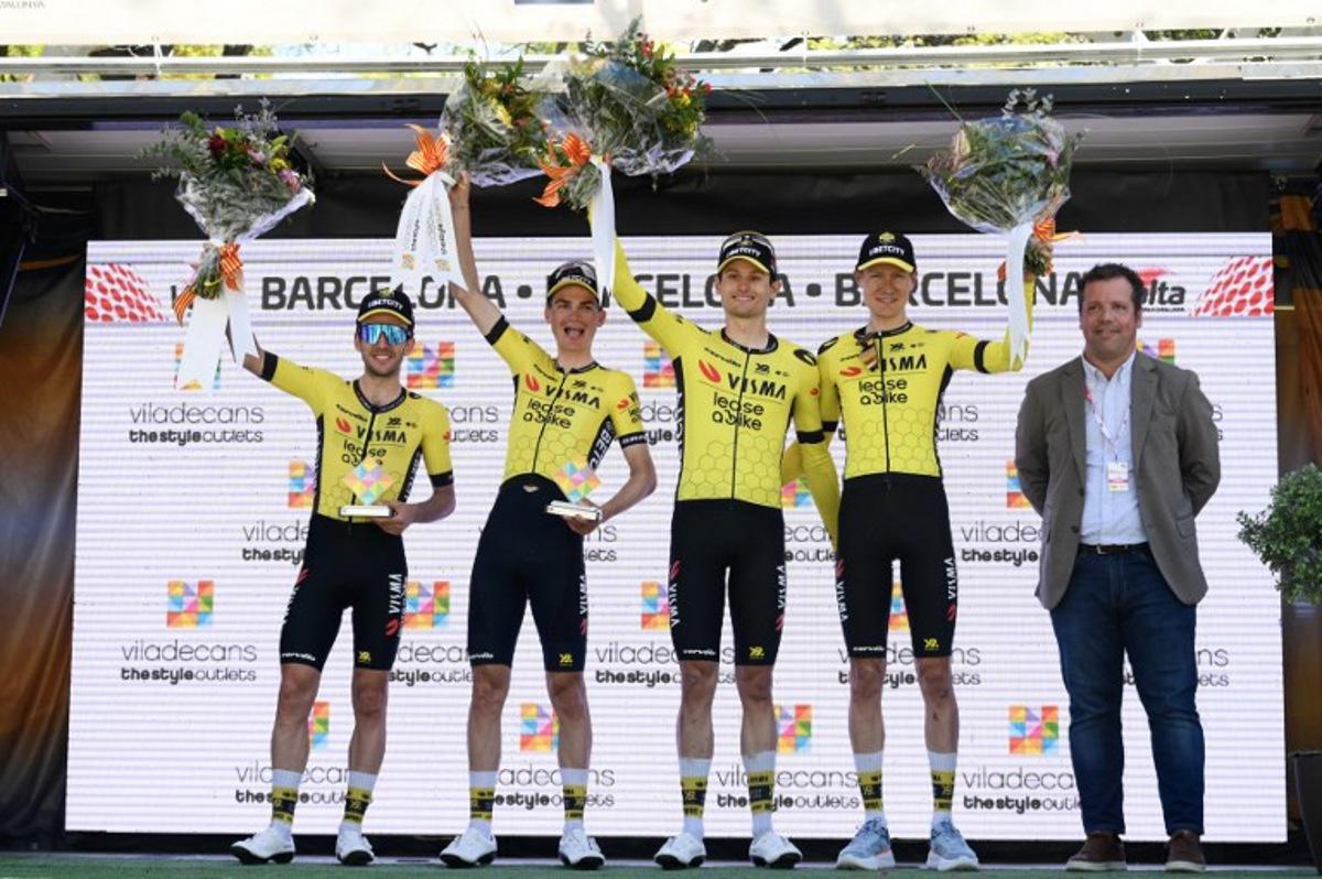 (L-R) Team Visma-Lease a bike's Simon Yates, Team Visma-Lease a bike's Sepp Kuss, Team Visma-Lease a bike's Menno Huising and Team Visma-Lease a bike's Wilco Kelderman celebrate winning the Team Category on the podium for the 2025 Volta a Catalunya cycling tour of Catalonia race, in Barcelona, on March 30, 2025. Josep LAGO / AFP