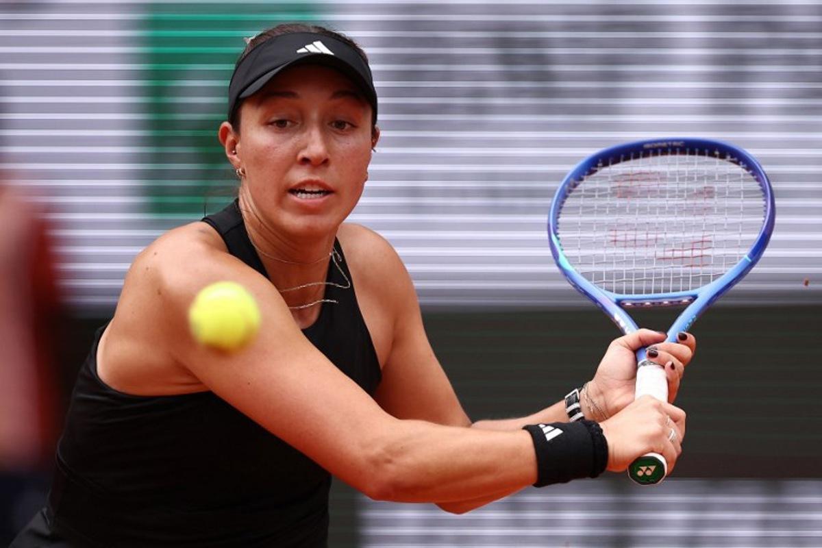 US Jessica Pegula plays a backhand return to Czech Republic's Marketa Vondrousova during their women's singles match on day 7 of the French Open tennis tournament on Court Philippe-Chatrier at the Roland-Garros Complex in Paris on May 31, 2025. Anne-Christine POUJOULAT / AFP