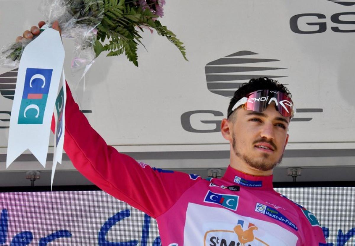 Team St Michel-Auber 93's Jason Tesson of France celebrates on the podium after winning the second stage of the "4 jours de Dunkerque" (Four days of Dunkirk) cycling race and taking the lead in the general classification, in Maubeuge, Northern France, on May 4, 2022. FRANCOIS LO PRESTI / AFP