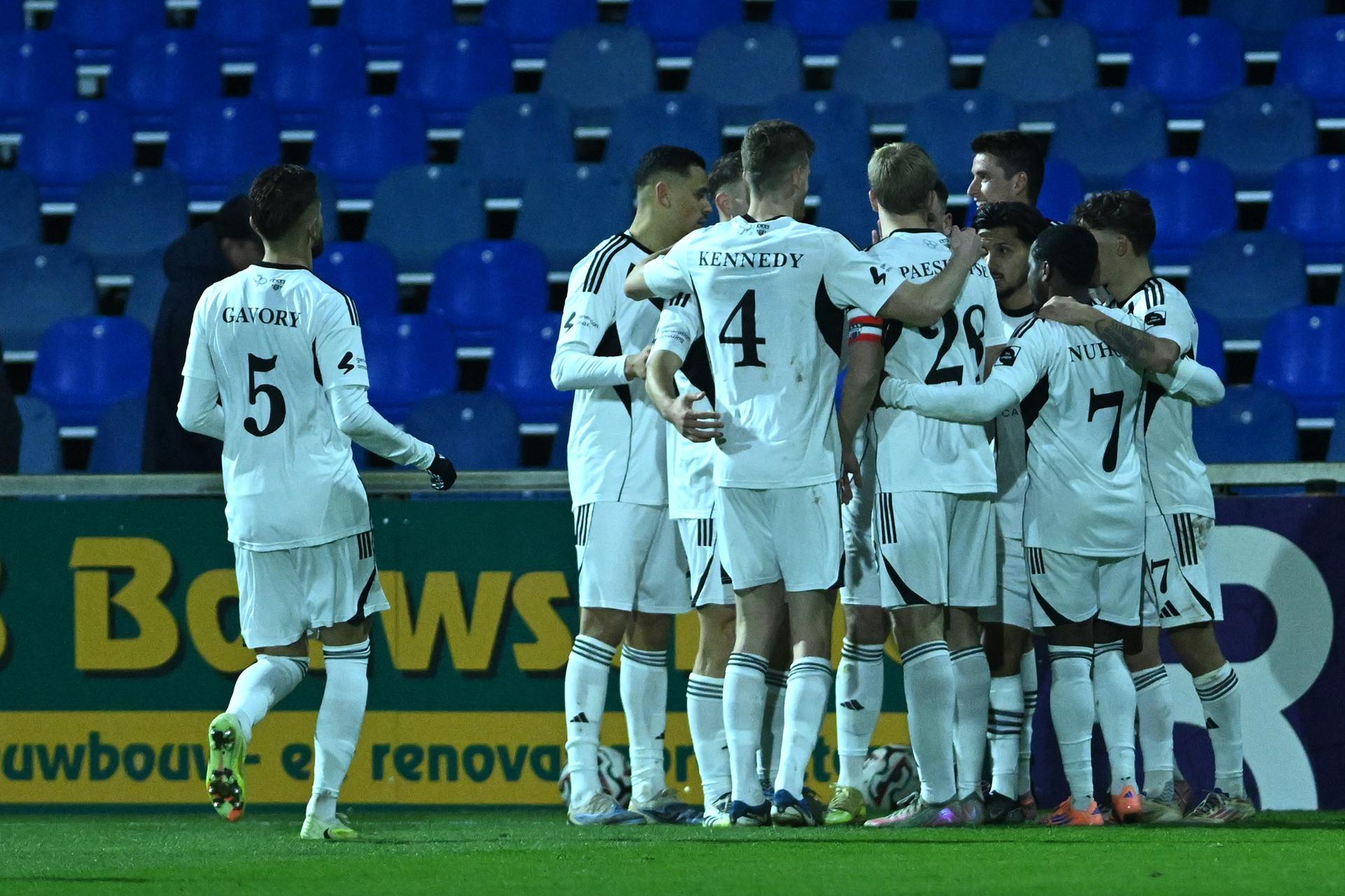 Eupen's players celebrate after scoring during a soccer game between Patro Eisden Maasmechelen and KAS Eupen, Thursday 18 December 2025 in Maasmechelen, on day 18 of the 2025-2026 'Challenger Pro League' 1B second division of the Belgian championship. BELGA PHOTO LUC CLAESSEN