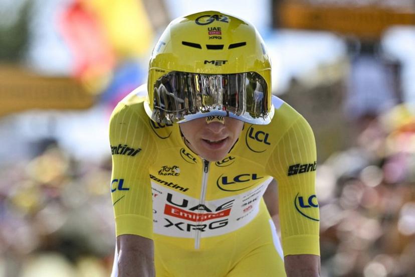 UAE Team Emirates - XRG's Slovenian rider Tadej Pogacar wearing the overall leader's yellow jersey cycles past the Lac Leman during the 16th stage of the 113th edition of the Tour de France cycling race, 26,1 km time trial between Évian-les-Bains and Thonon-les-Bains in the French Alps, on July 21, 2026. Jeff PACHOUD / AFP