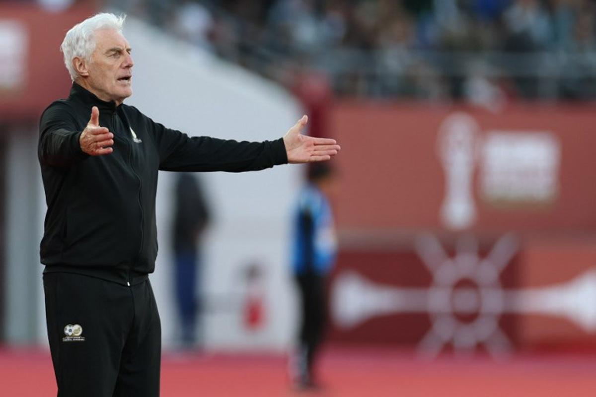 South Africa's head coach Hugo Broos reacts after being denied a penalty during the Africa Cup of Nations (CAN) Group B football match between Egypt and South Africa at Adrar Stadium in Agadir on December 26, 2025. FRANCK FIFE / AFP