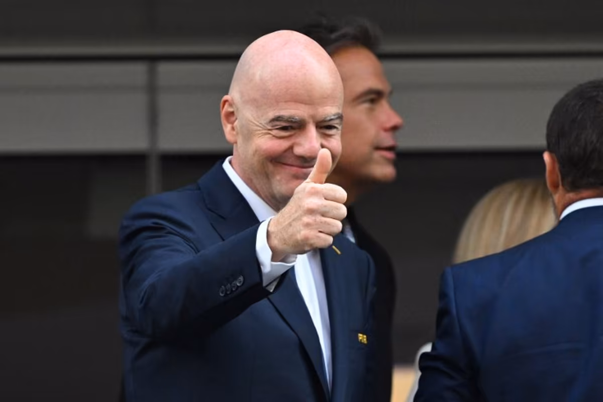 FIFA president Gianni Infantino gives a thumbs up ahead of the 2026 World Cup Group D football match between USA and Paraguay at the Los Angeles Stadium in Inglewood on June 12, 2026. Patrick T. Fallon / AFP