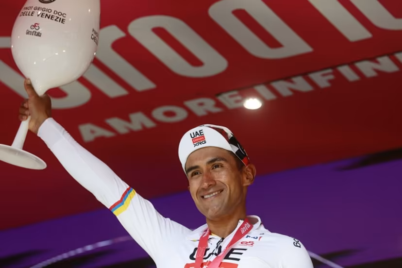 UAE Team Emirates - XRG Ecuadorian rider Jhonatan Narvaez celebrates on the podium after winning the 8th stage of the Giro d'Italia 2026 - Tour of Italy cycling race between Chieti and Fermo, central Italy on May 16, 2026. Luca Bettini / AFP