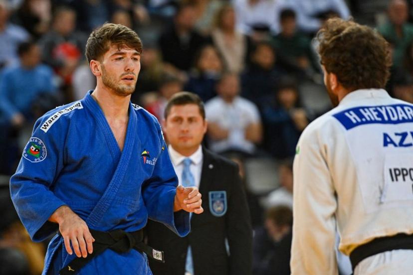 Belgium's Abdul Malik Umayev (white) and Azerbaijan's Hidayat Heydarov (blue) compete in the men's under 73 kg qualifying round during the European Judo Championships 2023 at the Sud de France Arena in Montpellier, southern France, on November 4, 2023. Sylvain THOMAS / AFP