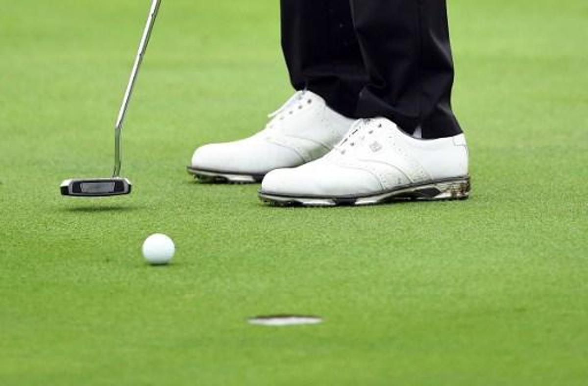 Daniel Berger of the US makes a putt at the World Golf Championships-HSBC Champions golf tournament in Shanghai on October 27, 2016.
JOHANNES EISELE / AFP