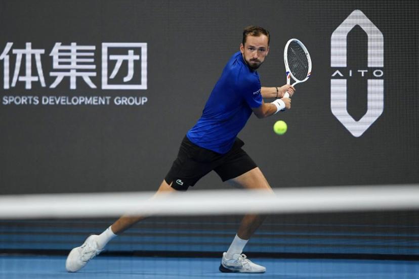 Russia's Daniil Medvedev hits a return to Hong Kong's Coleman Wong during their men's singles quarter-final match at the Hangzhou Open tennis tournament in Hangzhou, in China's eastern Zhejiang province on September 27, 2026. STR / AFP
