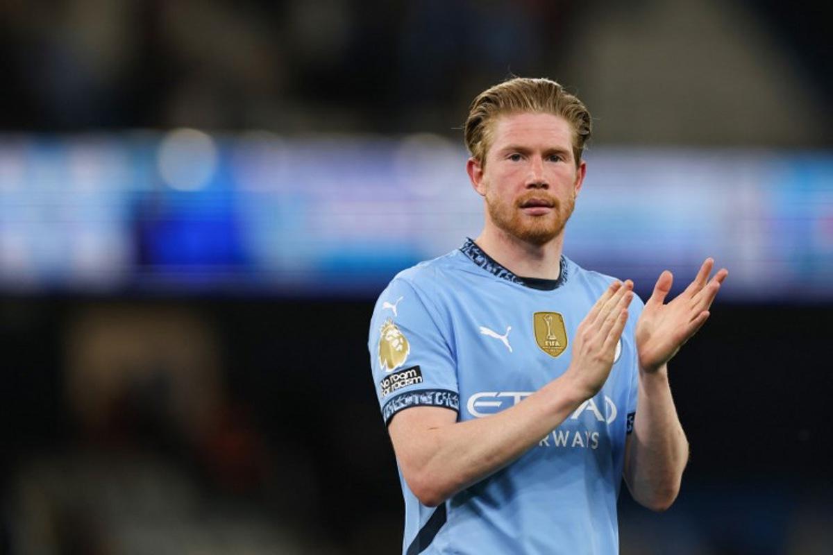 Manchester City's Belgian midfielder #17 Kevin De Bruyne applauds at the end of the English Premier League football match between Manchester City and Wolverhampton Wanderers at the Etihad Stadium in Manchester, north west England, on May 2, 2025. Manchester City wins 1 - 0 against Wolverhampton Wanderers. Darren Staples / AFP