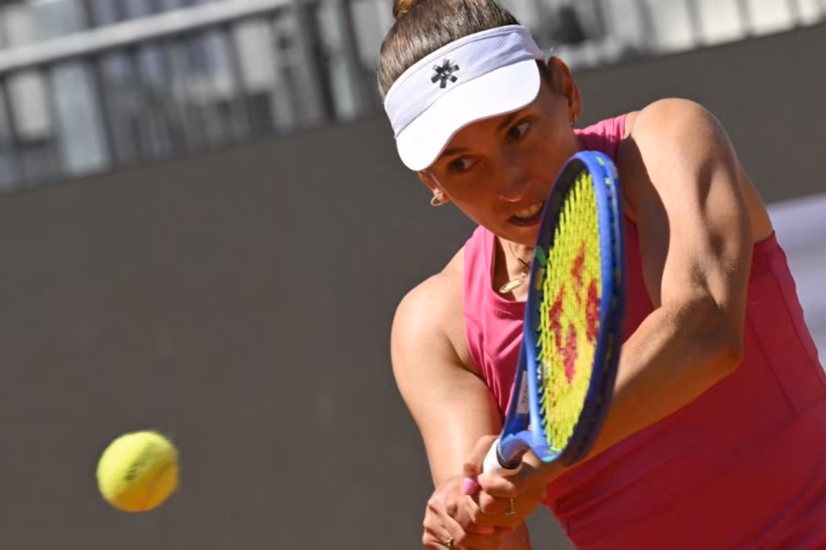 Belgium's Elise Mertens hits a return to Russia's Mira Andreeva during the WTA Rome Open tennis tournament at Foro Italico in Rome on May 11, 2026. Andreas SOLARO / AFP
