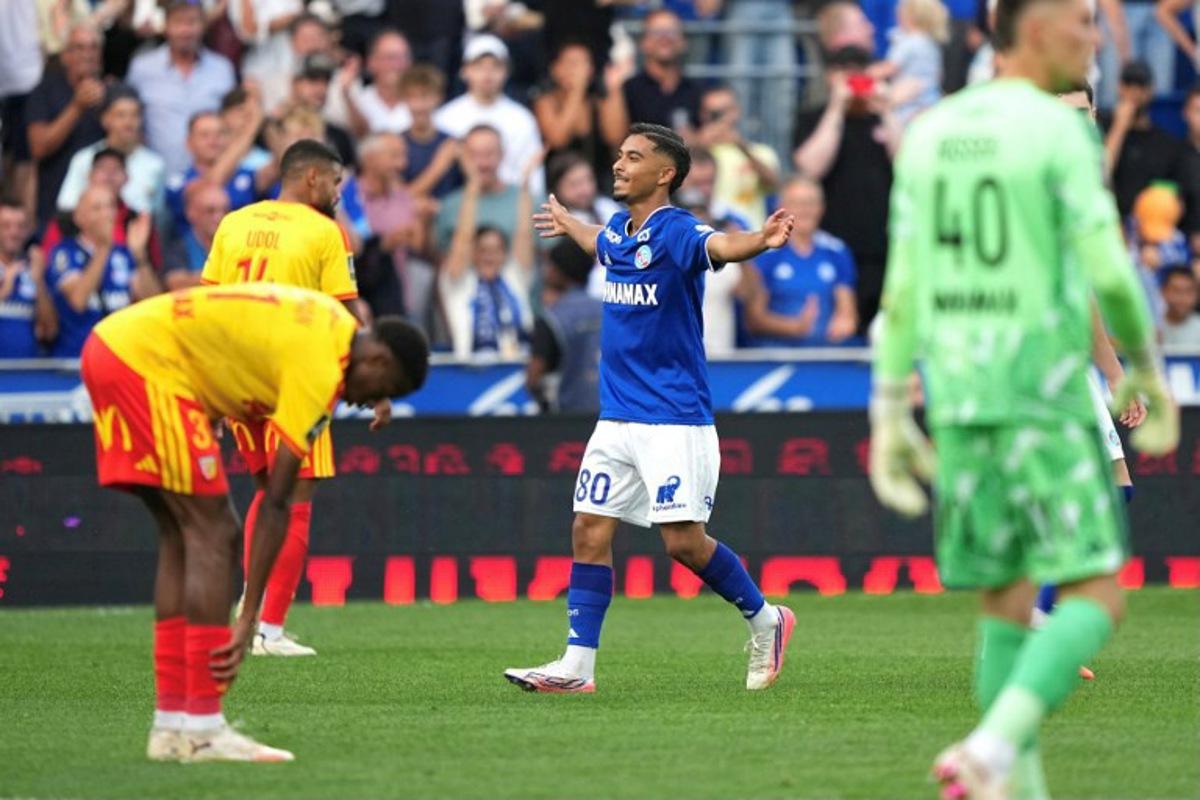 Strasbourg's Moroccan forward #80 Gessime Yassine celebrates his team's first goal during the French L1 football match between RC Strasbourg Alsace and RC Lens at the Stade de la Meinau in Strasbourg, eastern France, on August 29, 2026. SEBASTIEN BOZON / AFP