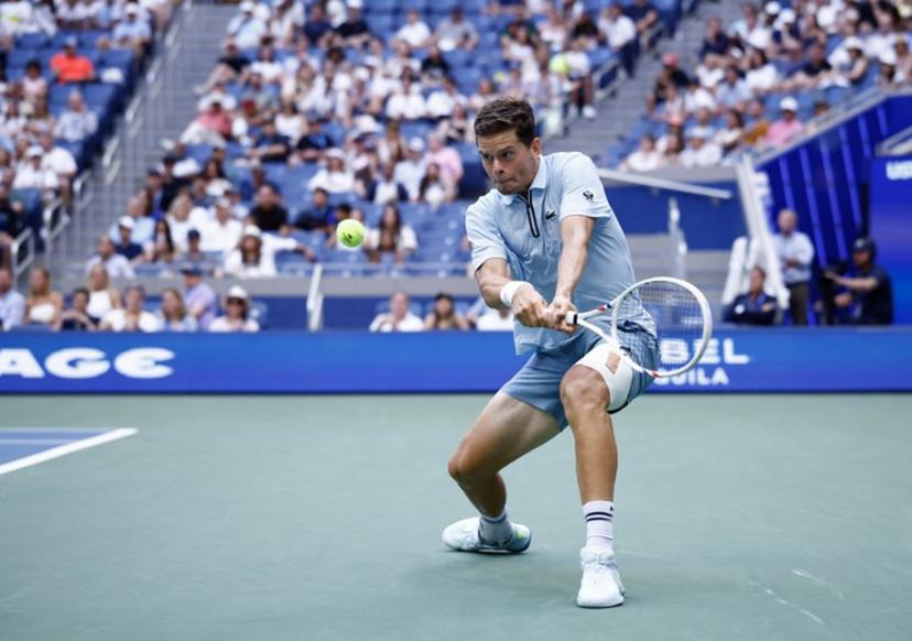 Belgium's Alexander Blockx hits a return to Argentina's Francisco Cerundolo during their men's singles round of 16 tennis match on day nine of the US Open tennis tournament at the USTA Billie Jean King National Tennis Center in New York on September 7, 2026. kena betancur / AFP