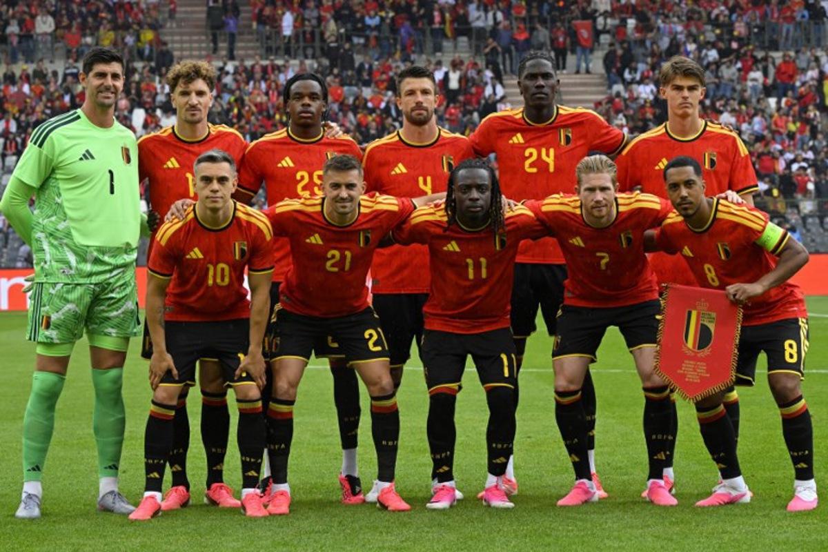 (LtoR) Belgium's goalkeeper #1 Thibaut Courtois, Belgium's defender #12 Thomas Meunier, Belgium's midfielder #10 Leandro Trossard, Belgium's defender #3 Nathan Ngoy, Belgium's defender #21 Timothy Castagne, Belgium's defender #4 Brandon Mechele, Belgium's midfielder #11 Jeremy Doku, Belgium's midfielder #18 Amadou Onana, Belgium's midfielder #7 Kevin De Bruyne, Belgium's midfielder #8 Youri Tielemans and Belgium's forward #17 Charles De Ketelaere pose ahead of the international friendly football match between Belgium and Tunisia at the King Baudouin Stadium in Brussels on June 6, 2026. JOHN THYS / AFP