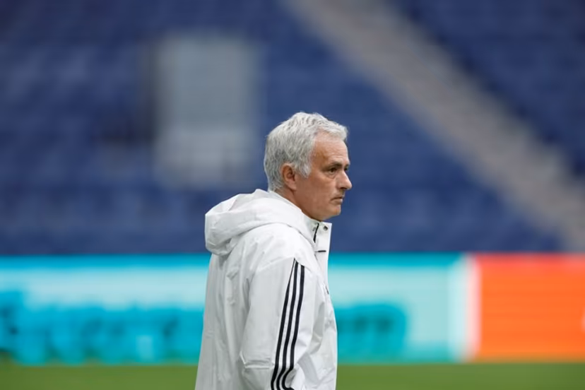 SL Benfica's Portuguese head coach Jose Mourinho looks on during a training on the eve of their UEFA Champions League knockout round play-off second leg football match against Real Madrid CF at Santiago Bernabeu Stadium in Madrid on February 24, 2026. Oscar DEL POZO / AFP