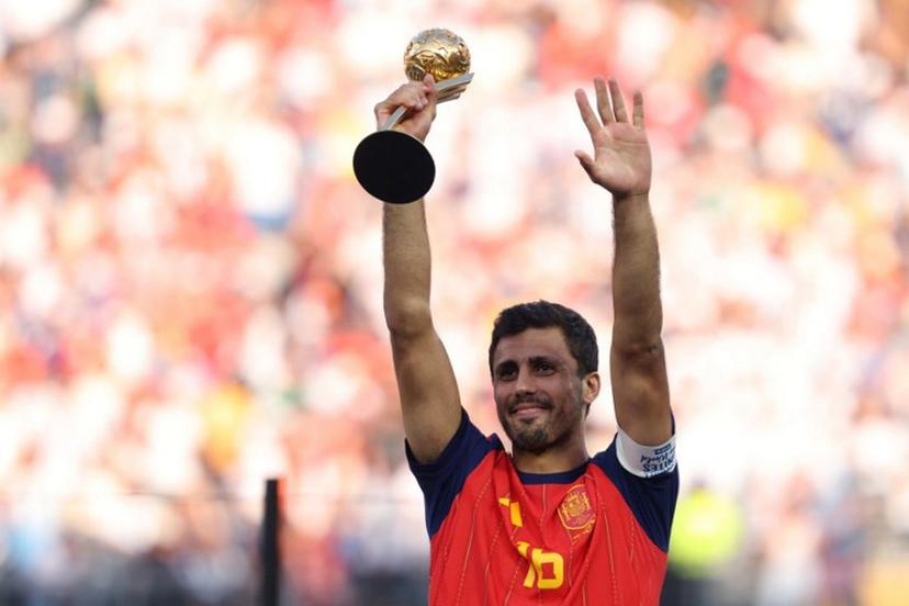 Spain's midfielder #16 Rodri holds the Golden Ball award during the award ceremony of the 2026 World Cup football tournament final match between Spain and Argentina at the New York/New Jersey Stadium in East Rutherford on July 19, 2026. Odd ANDERSEN / AFP